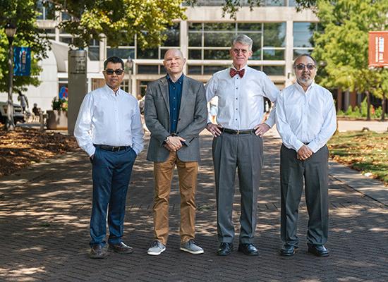 从左到右:博士. Farooq Khan, 在线博彩 professor of chemistry; Dr. John Hansen, 在线博彩 professor of chemistry; Dr. Martin McPhail, 在线博彩 associate professor of chemistry; and Dr. Ajith DeSilva，物理学教授